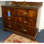 A low mahogany chest fitted with two short and two long drawers, with glass cover, width 105cm.