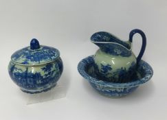 A reproduction blue and white jug and basin set, together with a jar and cover.