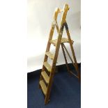 Two old step ladders.