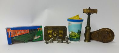 Antique cork screw, Great War 'Mary' Tin, novelty Thunder Birds soap and drink set.