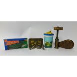 Antique cork screw, Great War 'Mary' Tin, novelty Thunder Birds soap and drink set.