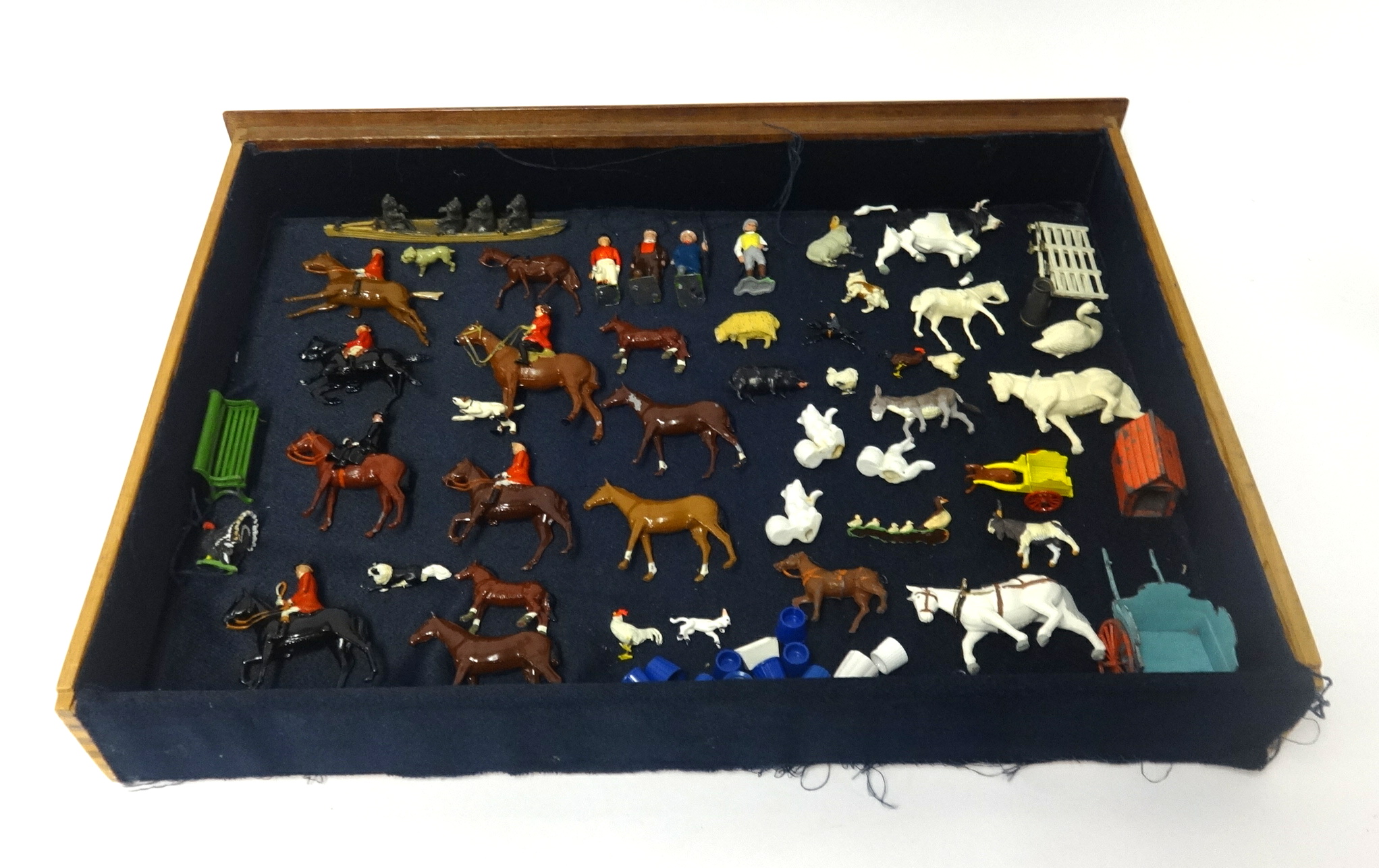 Collection of painted led hunting figures, farmyard animals and Britain's plastic figures.
