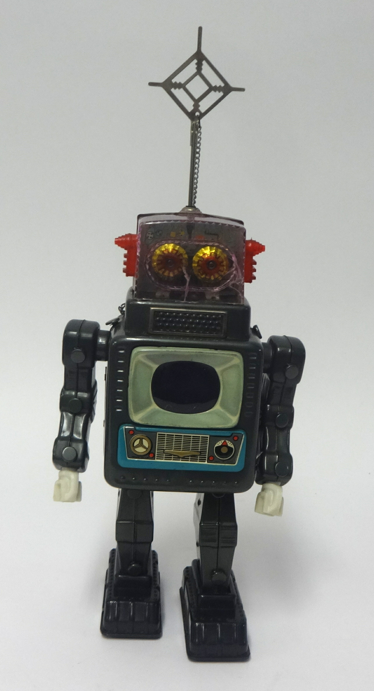 An ALPS Japanese battery operated tinplate Television Spaceman Robot in original box, 38cm high.