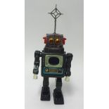 An ALPS Japanese battery operated tinplate Television Spaceman Robot in original box, 38cm high.
