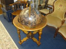 DRINKS CABINET, Terrestrial globe form with hinged top, with various decanters, drinkng glasses