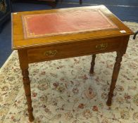 Edwardian oak side table with leather writing surface fitted with a single drawer, width 76cm.