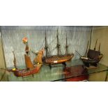 THREE WOODEN MODELS OF SAILING SHIPS