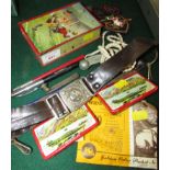 VINTAGE CHAD VALLEY MONEY TIN WITH CONTENTS OF PENS, PATCHES, BUTTONS, STAMPS AND OTHER ITEMS