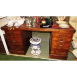 SUBSTANTIAL OAK PEDESTAL DESK WITH TEN DRAWERS, METAL HANDLES AND LEATHER INSERT TOP (A/F)