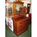 OAK THREE DRAWER DRESSING CHEST IN THE ART NOUVEAU STYLE WITH DECORATIVE METAL HANDLES AND THREE