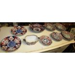 SELECTION OF ORIENTAL STYLE CERAMIC PLATES AND DISHES DECORATED WITH STYLIZED FLOWERS, TOGETHER WITH