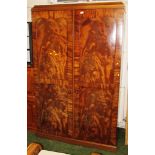 LARGE FLAMED MAHOGANY VENEERED TWO DOOR SECTIONAL WARDROBE