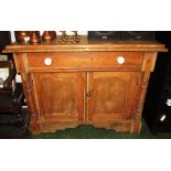 PINE DRESSER BASE WITH SINGLE DRAWER WITH CHINA HANDLES OVER TWO CUPBOARD DOORS