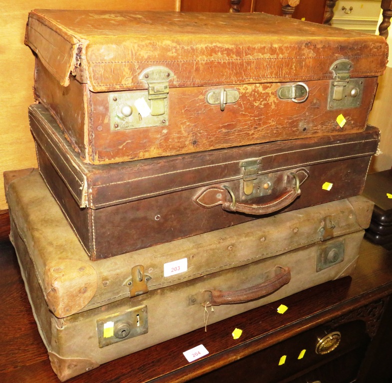 TWO VINTAGE LEATHER TRAVEL CASES AND ONE OTHER TRAVEL CASE (A/F)