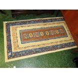 SMALL CREAM GROUND PATTERNED FLOOR RUG