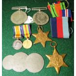 Four WW II medals - Defence Medal, War Medal, The France and Germany Star, and The 1939-1945 Star,