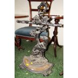 CAST METAL UMBRELLA STAND WITH TRAY MODELLED AS DOG AND BRANCH