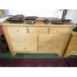 LIGHT WOOD CHEST OF THREE SMALL OVER FOUR LARGER DRAWERS