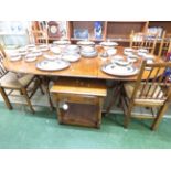 OAK D-END EXTENDING DINING TABLE AND SIX RUSH SEATED SPINDLE BACK CHAIRS