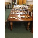 Victorian mahogany dining table with two leaves on baluster legs and castors with winder (size