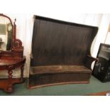 18th century curved high back elm settle with stained back panels in another wood, two hinged