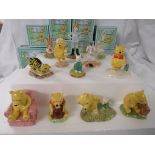 Twelve Royal Doulton 'The Winnie the Pooh Collection' figures - 'Pooh lights the candle', 'Pooh