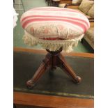 Late Victorian mahogany framed rotating stool on carved column quadruped base bearing a Gardiner &