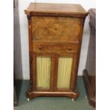 A mid Victorian burr walnut veneered secretaire music cabinet with boxwood stringing and inlay,