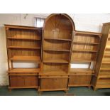 A 21st century bespoke breakfront display case constructed from oak felled near Honiton in 2000,