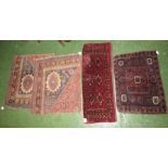 Four woven textiles - a fine Beluchi antique door band (98cm x 38cm); a fine Turkoman bag face (71cm