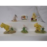 Four unboxed Royal Doulton Winnie the Pooh collection figures - 'Piglet picking the violets'
