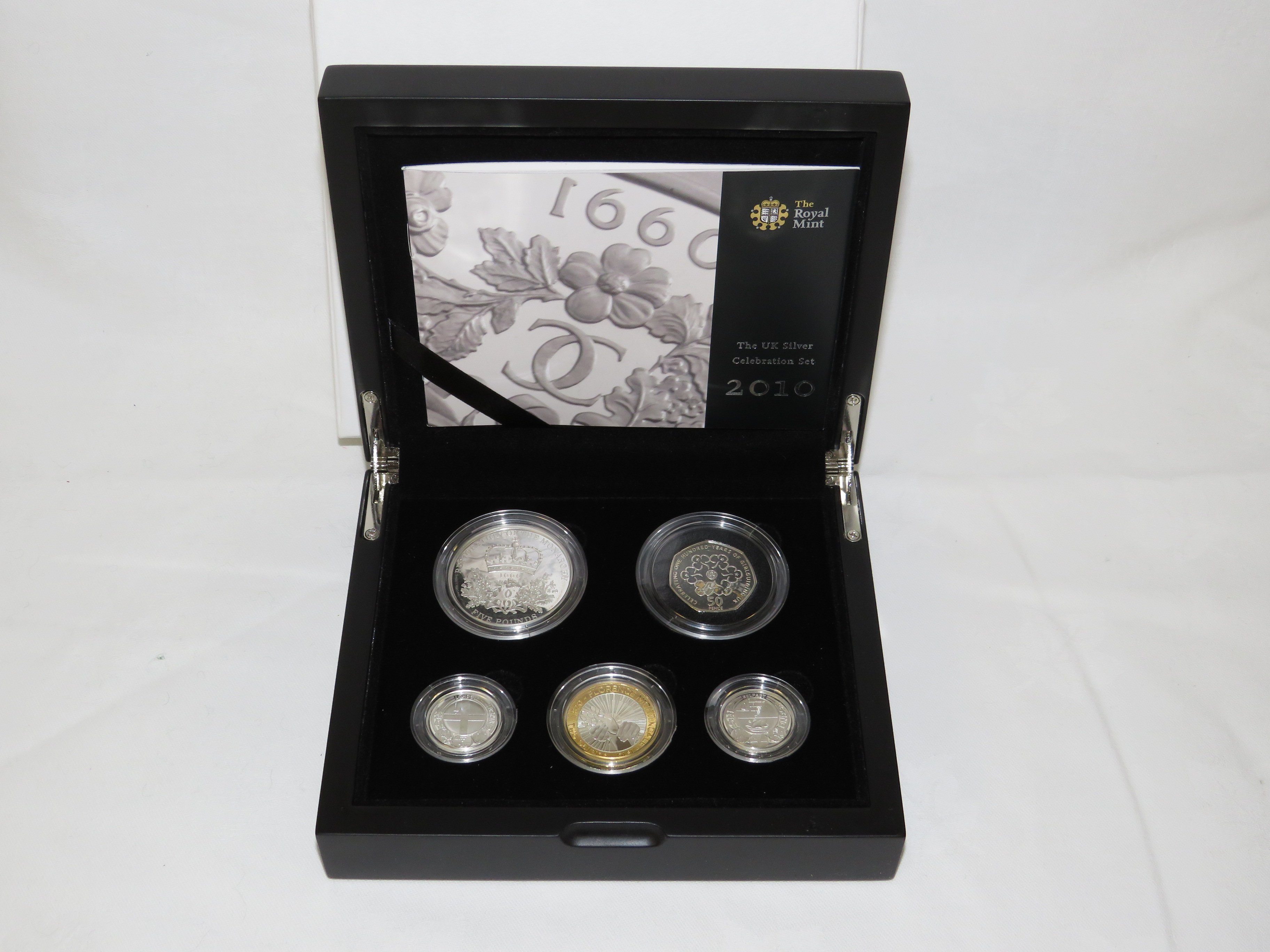 Royal Mint United Kingdom UK Silver Celebration Set 2010 - £5 coin, £2 coin, fifty pence coin, and