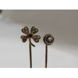 Gold stick pin with terminal modelled as a four-leaf clover and set with twelve seed pearls and a