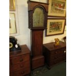 A late 18th century mahogany long case clock with an inlaid square hood, twisted side column