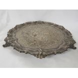 Edwardian silver circular salver, scrolled rim with foliate engraving and three initials engraved