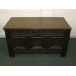 18th century oak three-panel coffer, the front carved with lozenges, tongue frieze carved AD and