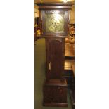 An early 19th century eight day striking oak long case clock by Fishwick of Boughton. The square