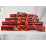 Fifteen boxed 00 gauge Hornby Railways carriages and wagons - seven R239, two R242, one R738, one