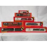 Seven boxed 00 gauge Hornby Railways trains - one R376, one R761, one R842, one R759, one R633,