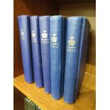 Five blue stamp albums containing early and later foreign and Commonwealth stamps including