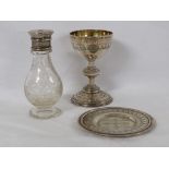A Victorian silver three-piece Communion set comprising chalice, paten and glass cruet with silver