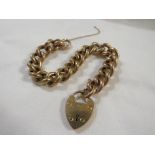 9ct gold hollow link bracelet with heart-shaped lock, 30g