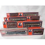 Eight boxed 00 gauge Lima Models carriages and wagons - four 303165, one 305656, one 305301, one