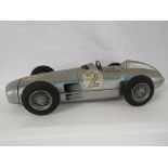 Tin plate friction drive model of a Mercedes W196 racing car, marked made in Western Germany,