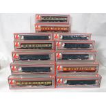 Thirteen boxed 00 gauge Lima Models carriages and wagons - three 305353, two 305354, three 305331,