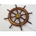 An eight spoke mahogany ship's wheel, diameter 76cm