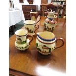 Five pieces of Watcombe Pottery Torquay motto ware including teapot 'Do the work thats