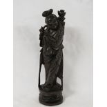 A Ming style carved hardwood figure of robed lady inset with white metal wires, height 28cm