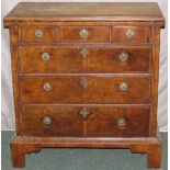 A fine 18th century George II walnut bachelor chest of drawers with fold over top of three long