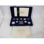 The Royal Mint The United Kingdom Millennium Silver Collection containing Millennium Crown, Two